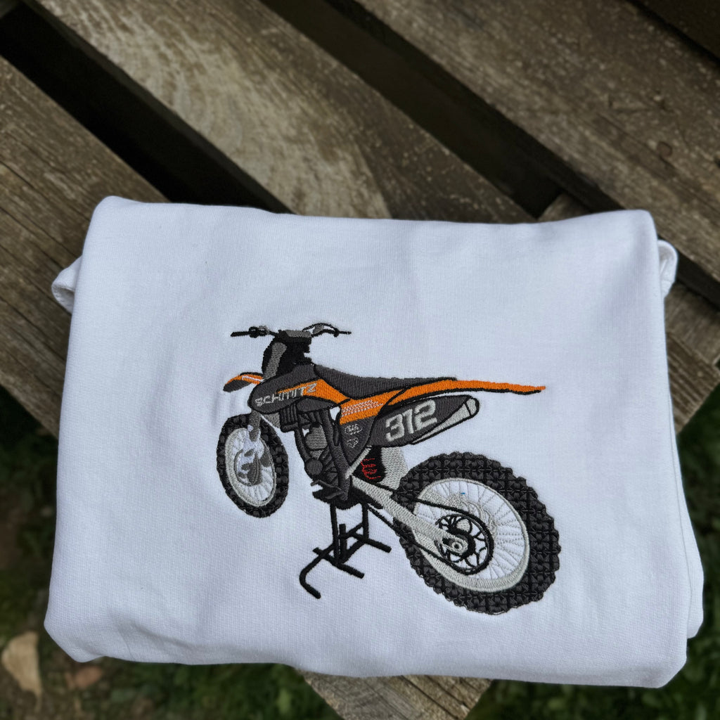 Tvoj Motor na oblačilu